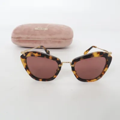 Lunettes de soleil (SMU 10N) de Miu Miu
