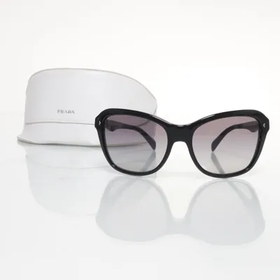 Glasögon (SPR24N) från Prada