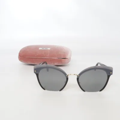 Glasses (SMU53T) from Miu Miu