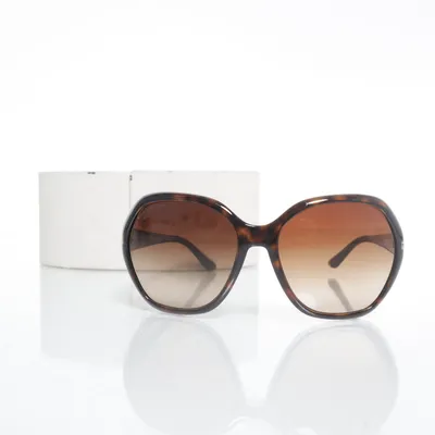 Sunglasses (SPR 14N) from Prada