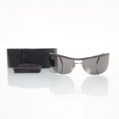 Sunglasses (SPR 12E) from Prada