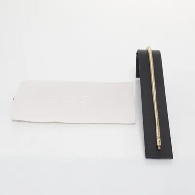 Fotlänk (Guldfärgad) från COS Okänd metall