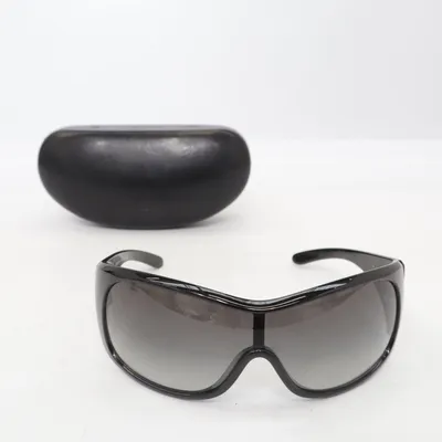 Sunglasses (SPR 14L) from Prada