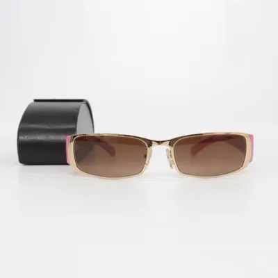 Sunglasses (SPR55G) from Prada
