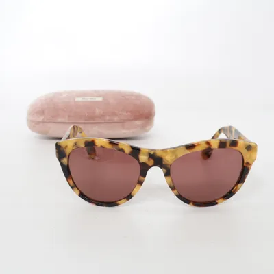 Sunglasses (SMU 09O) from Miu Miu
