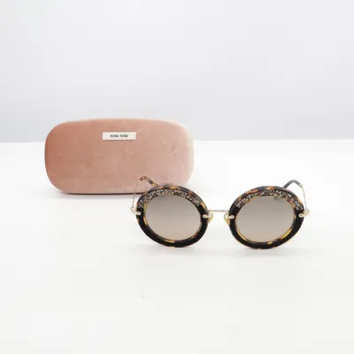 Lunettes de soleil (SMU08R) de Miu Miu