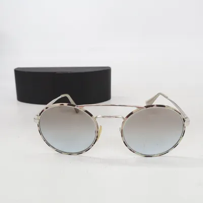 Sunglasses (SPR 51S) from Prada