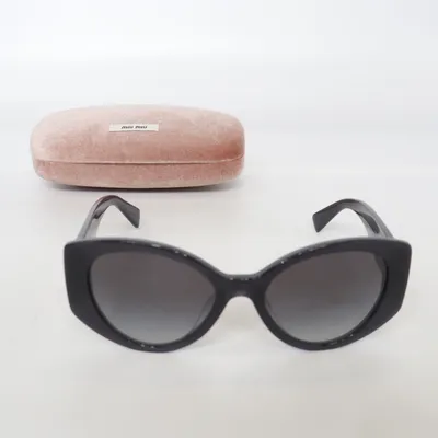 Sunglasses (SMU 03W) from Miu Miu