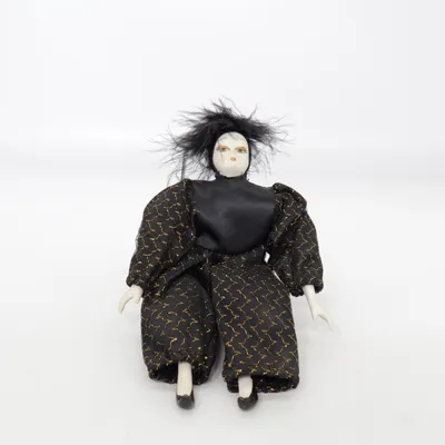 Poupée en porcelaine (Noir, Or)