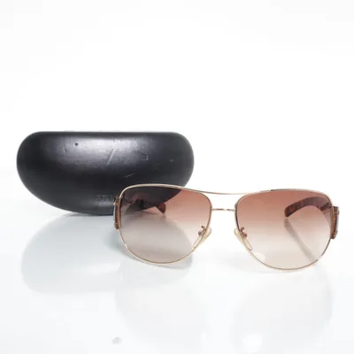 Solglasögon (SPR 52G) från Prada