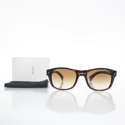 Sunglasses (SPR 14O) from Prada