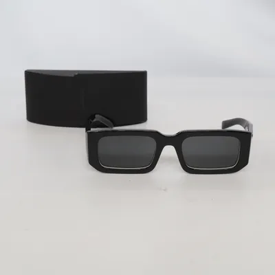 Sunglasses (SPR 06Y) from Prada