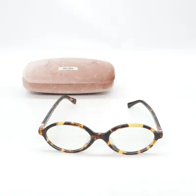 Lunettes (SMU 04Z-F) de Miu Miu