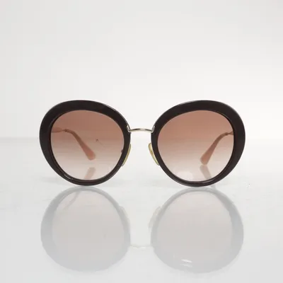 Sunglasses (SPR16Q) from Prada