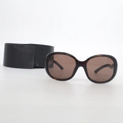 Sunglasses (SPR08L) from Prada