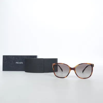 Zonnebril (SPR 01O) van Prada