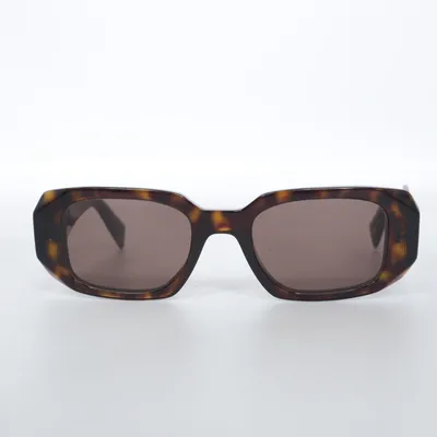 Solbriller (SPR 17W) fra Prada