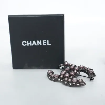 Broche (Zwart, Zilver) van Chanel Onbekend materiaal