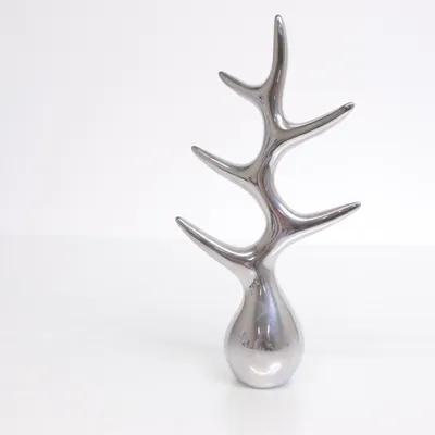 Figurin (Silverfärgad) från Menu