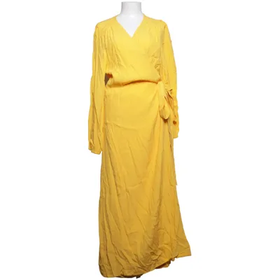Wikkeljurk (Geel) van Daisy Grace Elastaan, Polyester, Viscose