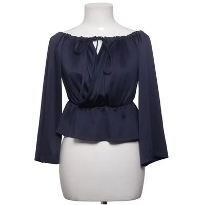Wikkelblouse (Blauw) van Linn Ahlborg x Rebecca Stella Elastaan, Polyester