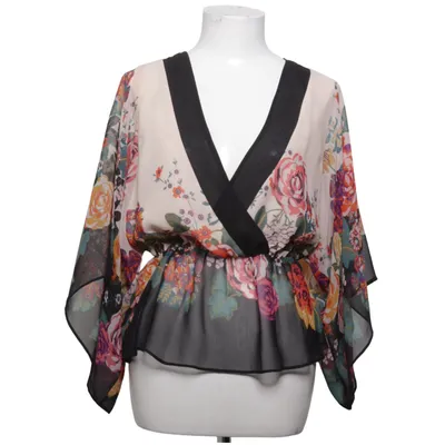 Slå-om bluse (Conscious Collection) fra H&M Conscious Collection Genanvendt polyester
