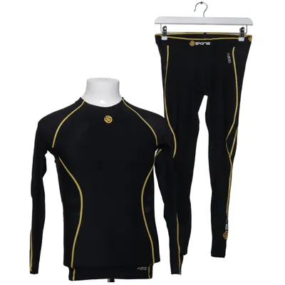 Vêtements thermique (Noir, Jaune) de Skins Élasthane, Polyamide
