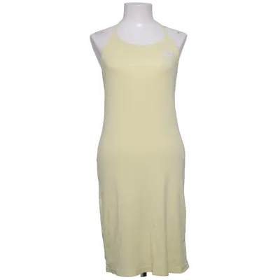 Robe dos-nu (Jaune) de Marwin Coton