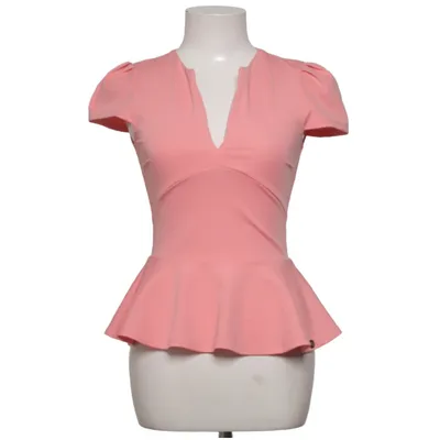 Top péplum (Rose) de Rich Bitch