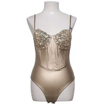 Body (gold bodysuit, gold corset, corset bodysuit, sequin bodysuit, glitter bodysuit, sparkly bodysuit, metallic bodysuit, metallic gold, champagne gold, luxury fashion, glam, glamorous, luxury look, designer inspired, premium, statement piece, statement outfit, party outfit, clubwear, nightclub, festival outfit, festival fashion, rave outfit, rave wear, EDM outfit, techno outfit, dancewear, performance outfit, stage outfit, burlesque, cabaret, showgirl, dancer, go go dancer, pole dance, drag, drag queen, cosplay, costume, carnival, Halloween, New Year's Eve, Christmas party, birthday outfit, bachelorette, bridal party, hen party, wedding guest, cocktail outfit, evening wear, sexy, elegant, chic, bodycon, one piece, bodysuit, corset top, bustier, sparkle, sequins, glitter, shimmer, rhinestone look, disco, Studio 54, Y2K, Y2K fashion, TikTok, TikTok fashion, TikTok viral, trending, viral fashion, aesthetic, Pinterest, Instagram, influencer, fashionista, luxury aesthetic, bold fashion, dopamine dressing, diva, queen, golden goddess, Barbiecore, festival queen, concert outfit, stage costume, photo shoot, editorial, runway, summer outfit, holiday outfit, vacation style, women's fashion.) Elastane, Polyester