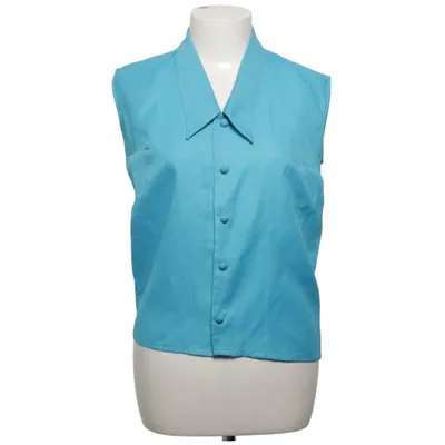Haut (Bleu) de Tergal Polyester