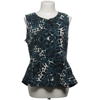 Peplum top (Blauw, Zwart, Wit) van Geena