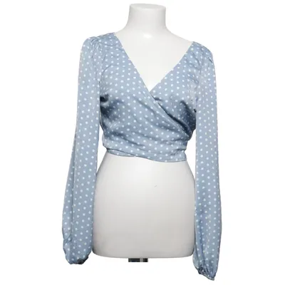 Wikkelblouse (Blauw, Wit) van Anika Teller x NA-KD Polyester