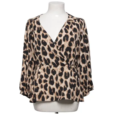 Top péplum (Beige, Noir) de Pigalle Polyester