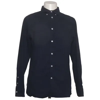 Buttondown-skjorta (Blå) från RVLT Revolution
