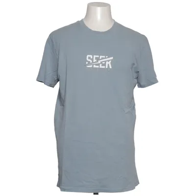 T-shirt (Blue) from Seek Discomfort