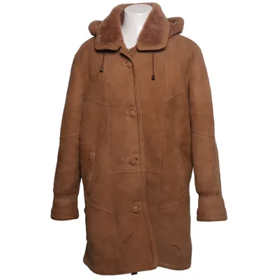 Veste en peau de mouton retournée (Beige) de Hucke Mode Collection