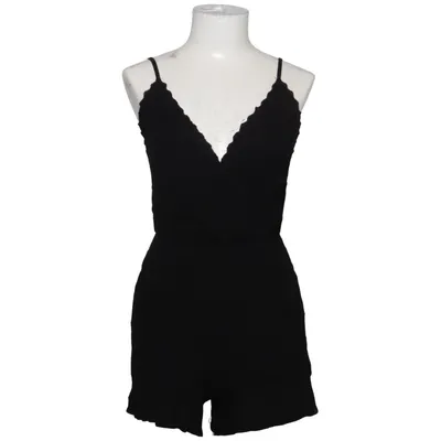 Byxdress (Svart) från About You