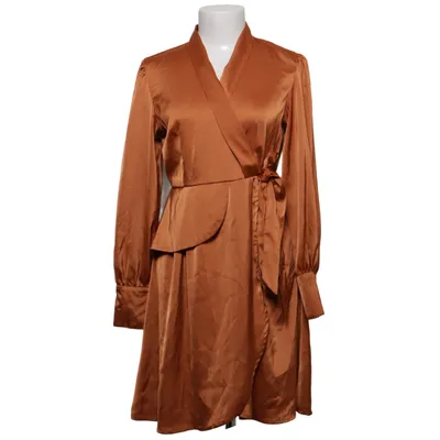 Wikkeljurk (Oranje) van Jus de Pom Elastaan, Polyester