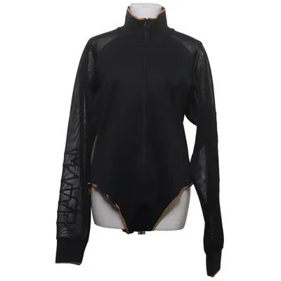Urheilupuku (Musta) kohteesta Adidas x Ivy Park