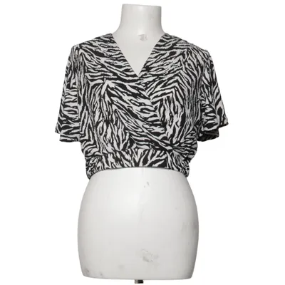 Wrap blouse (Black, White) from Ambar