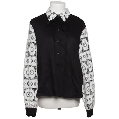 Blus (Svart, Vit) från James Lakeland