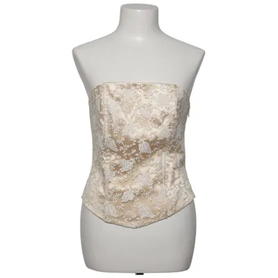 Korset (Beige) fra Yoko
