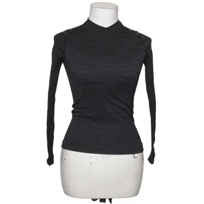Base layer shirt (Black, Gray) from Kipsta