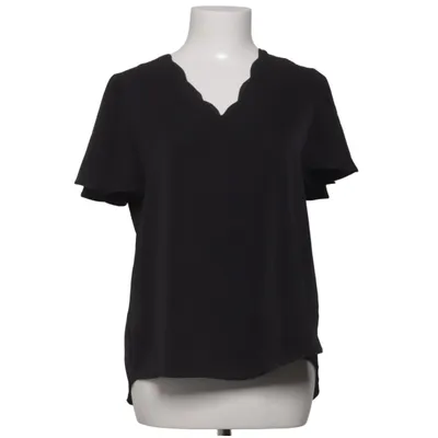 Haut (Noir) de Unika Polyester