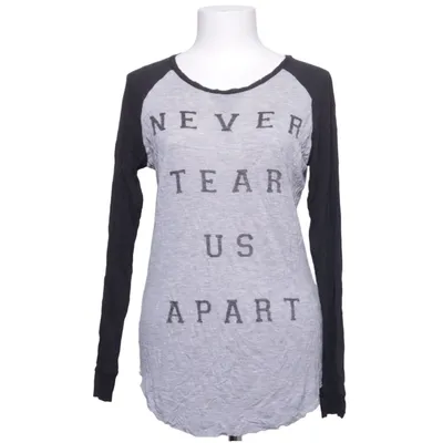 Honkball T-shirt (Never Tear Us Apart) van Zoe Karssen Viscose