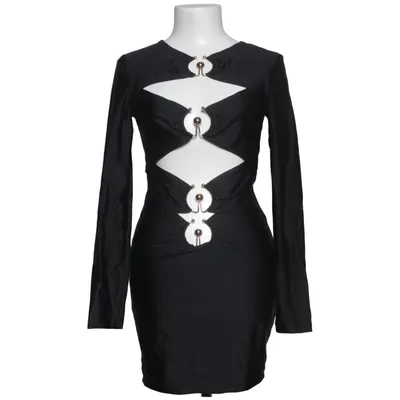 Klänning (Say Nothing Mini Dress) från Fashion Nova