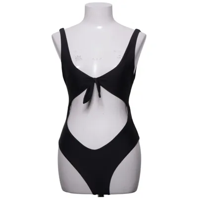 Baddräkt (The Knot Swimsuit) från Rebecca Stella Elastan, Polyamid, Polyester