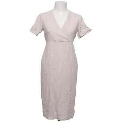 Robe portefeuille (Beige) de Momo