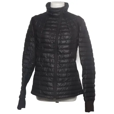 Daunenjacke (Schwarz) von Áhkká Daune, Feder, Polyamid, Polyester
